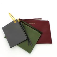 Exuberante Leather pochette - GRAPE/CAPER/FUM